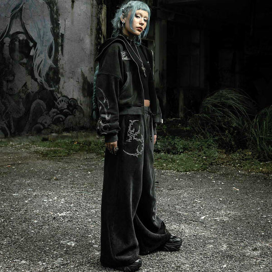 Oversized washed black flared sweatpants embroidery tribal gothic graphic — EXPND