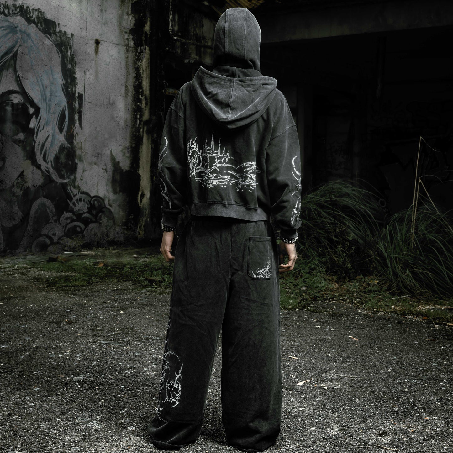 Oversized stonewashed black flared sweatpants and Shroud zip up hoodie oversized cropped embroidered tribal chest graphic embroidery tribal gothic graphic — EXPND