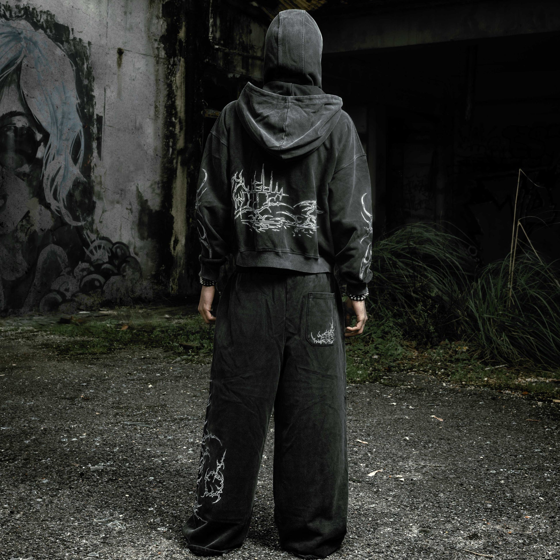 Oversized stonewashed black flared sweatpants and Shroud zip up hoodie oversized cropped embroidered tribal chest graphic embroidery tribal gothic graphic — EXPND