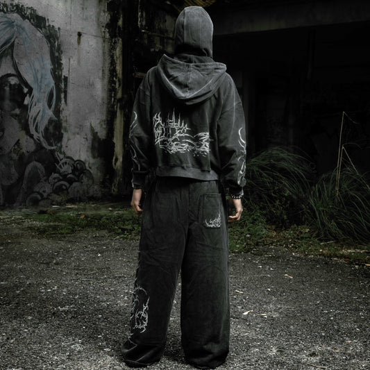 Oversized stonewashed black flared sweatpants and Shroud zip up hoodie oversized cropped embroidered tribal chest graphic embroidery tribal gothic graphic — EXPND